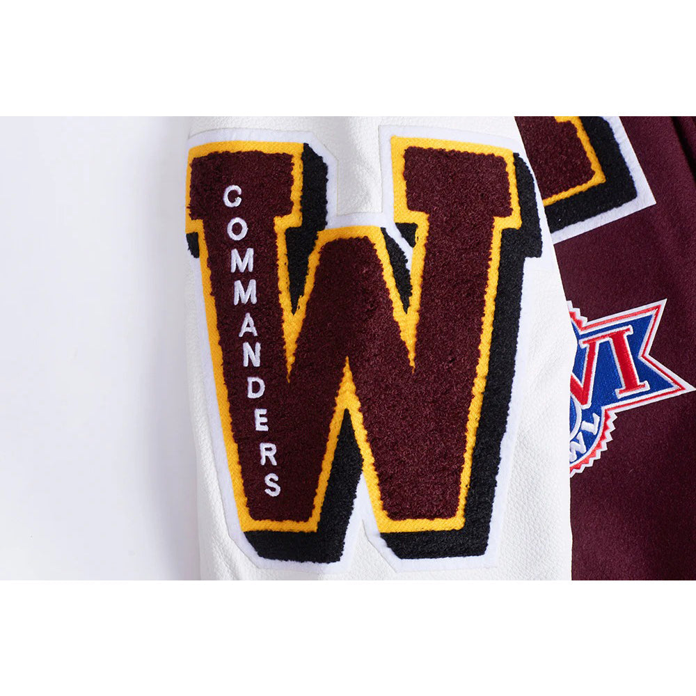 Close-up of a sports jersey with 'W' and 'COMMANDERS' 